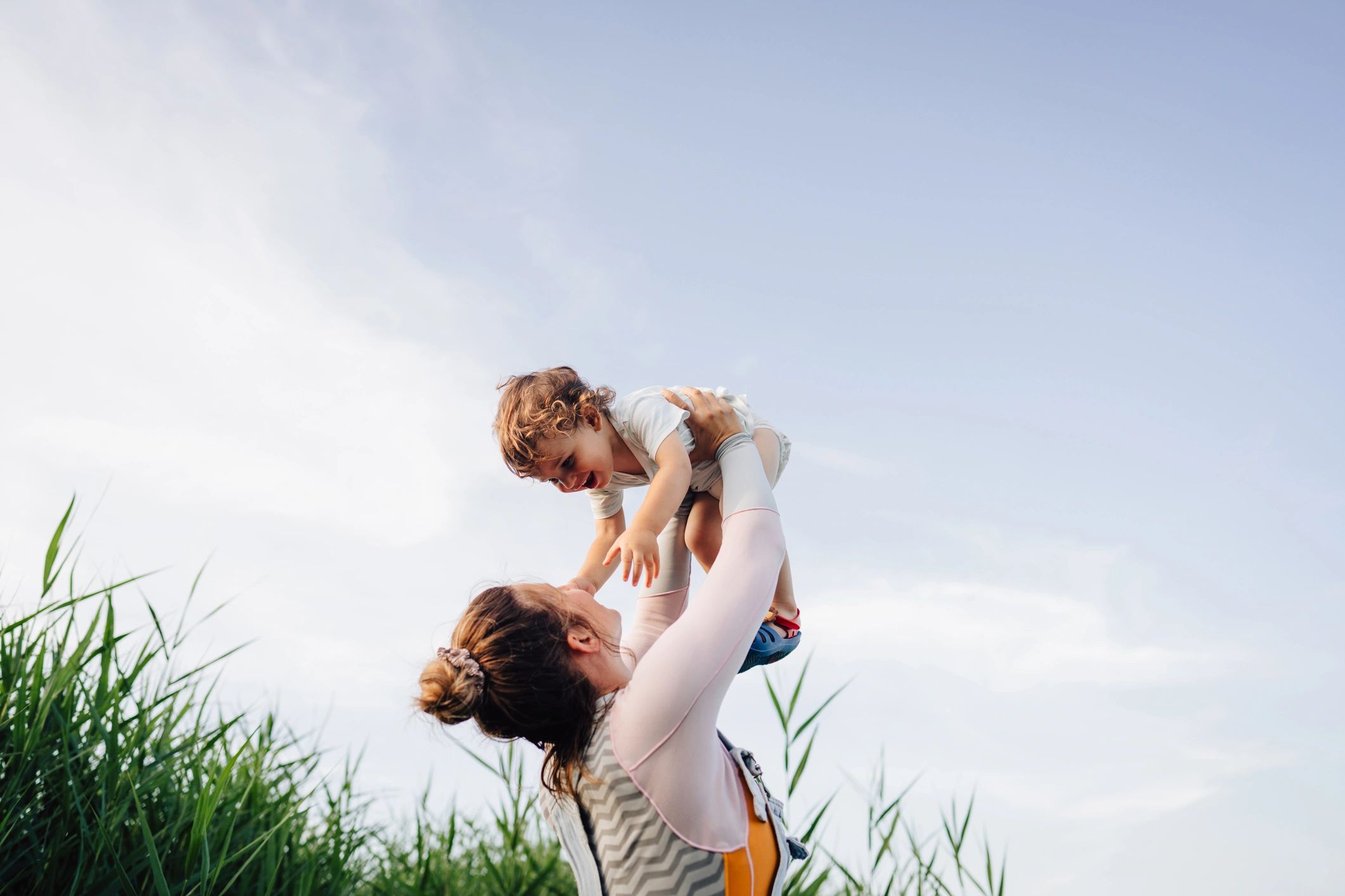 Parent and child enjoying time together outdoors