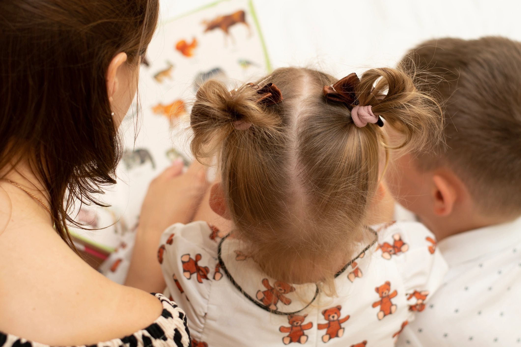 Family reading together at home