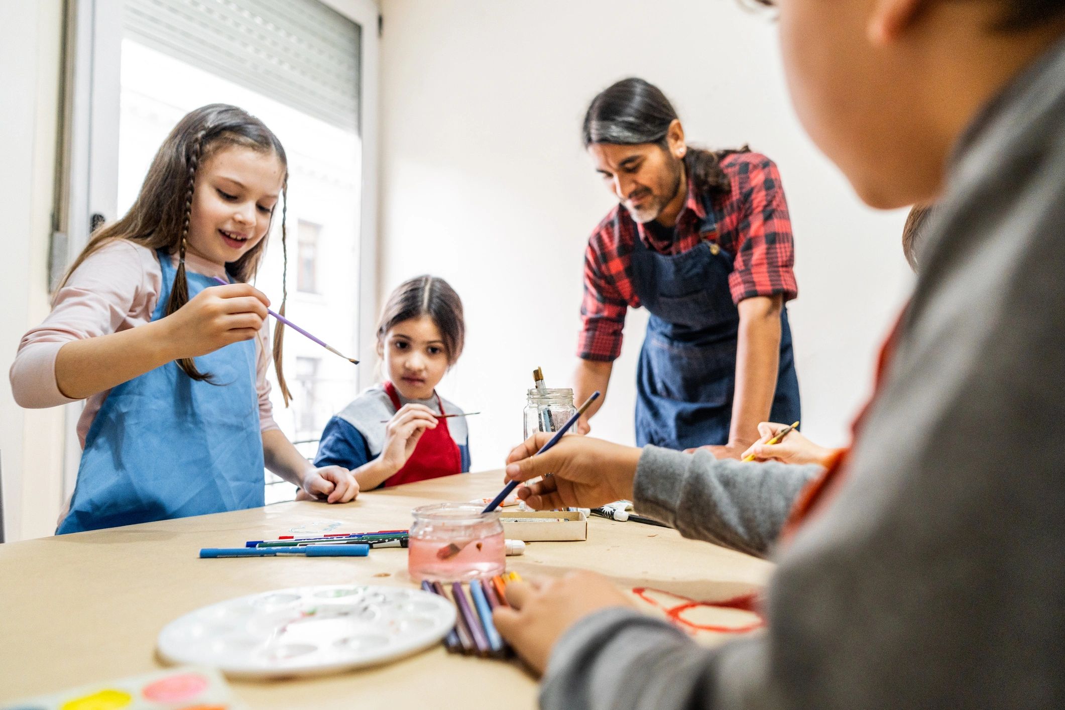 Children doing a painting activity together